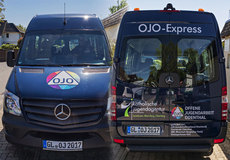 Entwurf und Beschriftung des OJO-Express mit gelieferten Logos im Digitaldruck und Folienplot